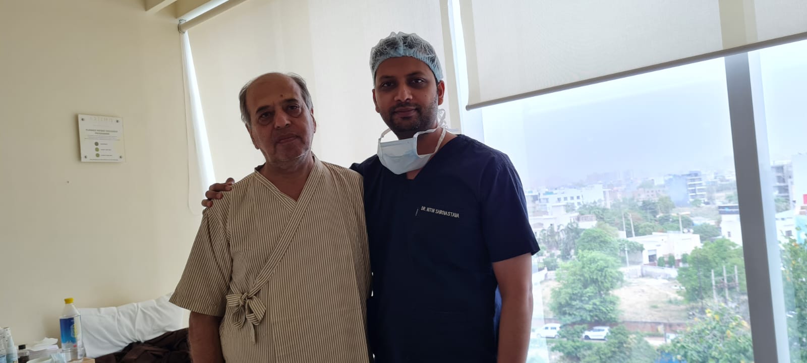Dr. Nitin Shrivastava greeting a patient at Apollo Hospital Gurugram