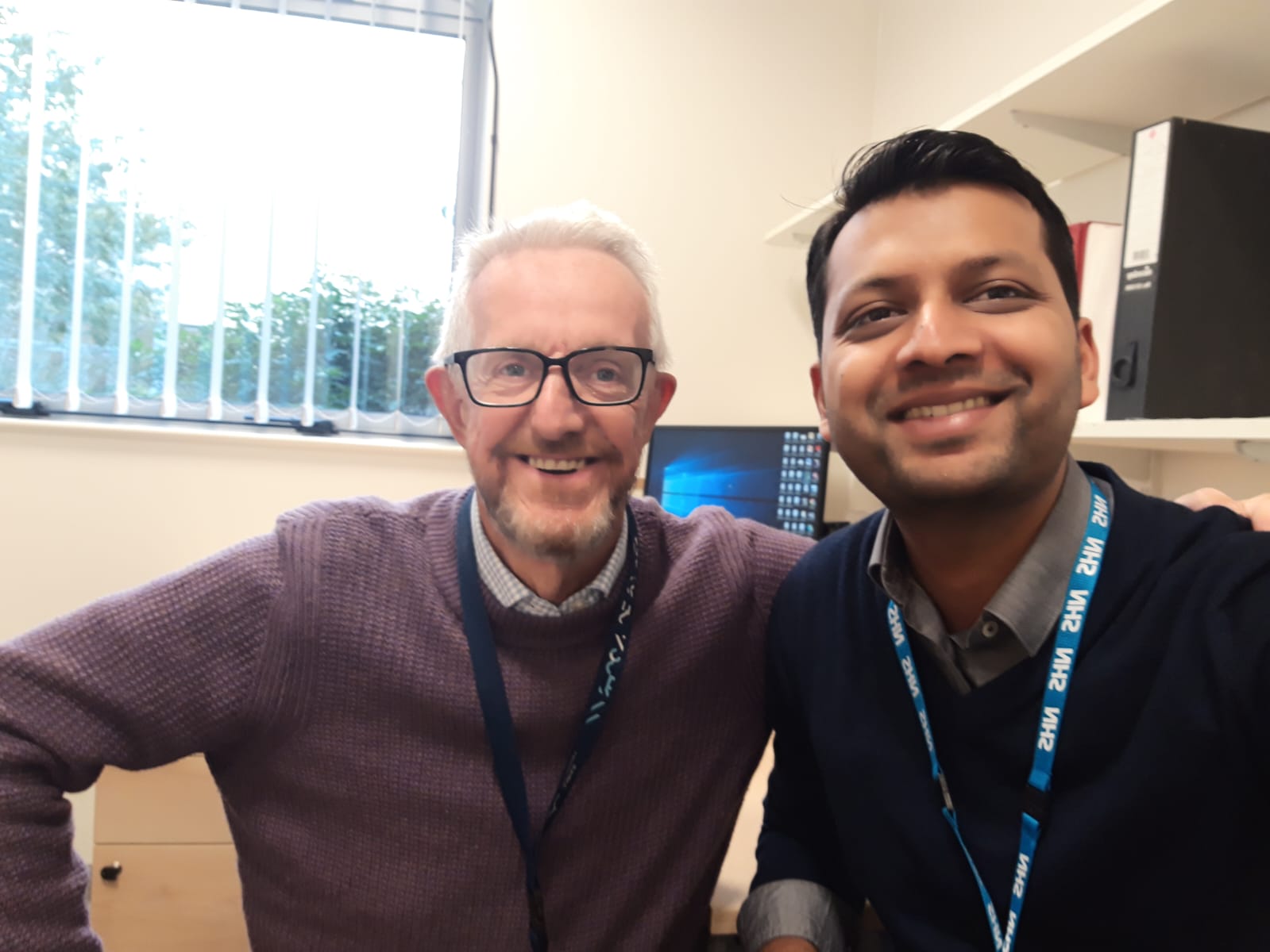Dr. Nitin Shrivastava with the Chief of Urology at Oxford University Hospitals during FRCS fellowship